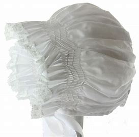 Feltman smocked lace bonnet